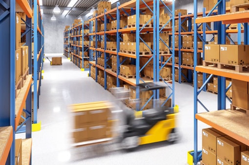 Forklift in warehouse cross docking facility